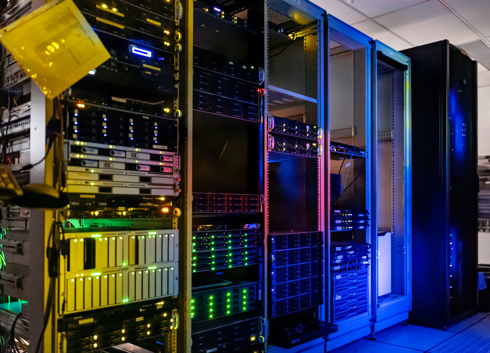 Server racks in a data center representing AI compute infrastructure