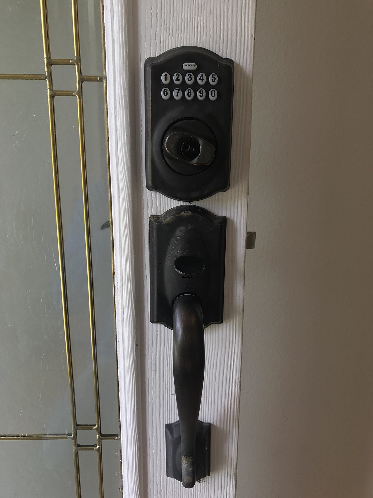 best smart locks 2026 — keypad deadbolt installed on a front door