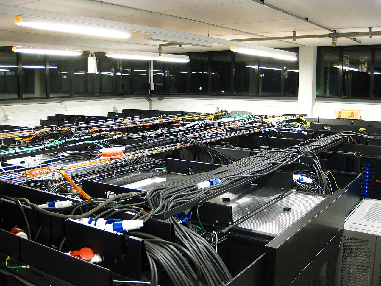 Claude AI cryptography flaws discovery 2026 — data center server room with cabling