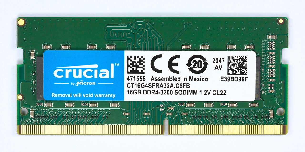 Close-up of a laptop SO-DIMM RAM memory module (Crucial by Micron, 16GB), illustrating the RAM pricing section of the laptop buying guide