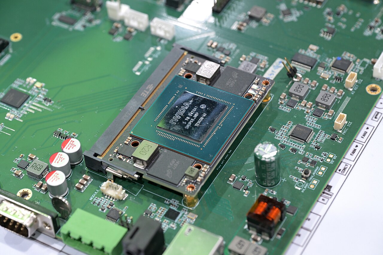 Close-up of an Nvidia system-on-chip mounted on a motherboard at Computex, illustrating the type of ARM-based Nvidia silicon underlying the N1X