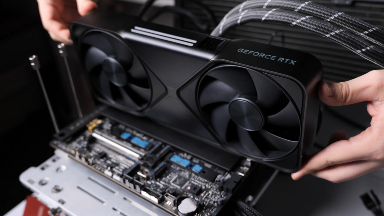 rtx 5090 price crisis 2026 -- GeForce RTX 5090 being installed into a PC build