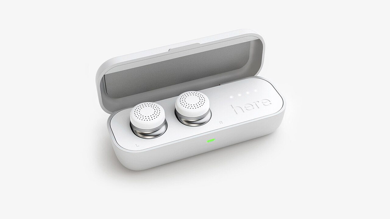 True wireless earbuds in a white charging case