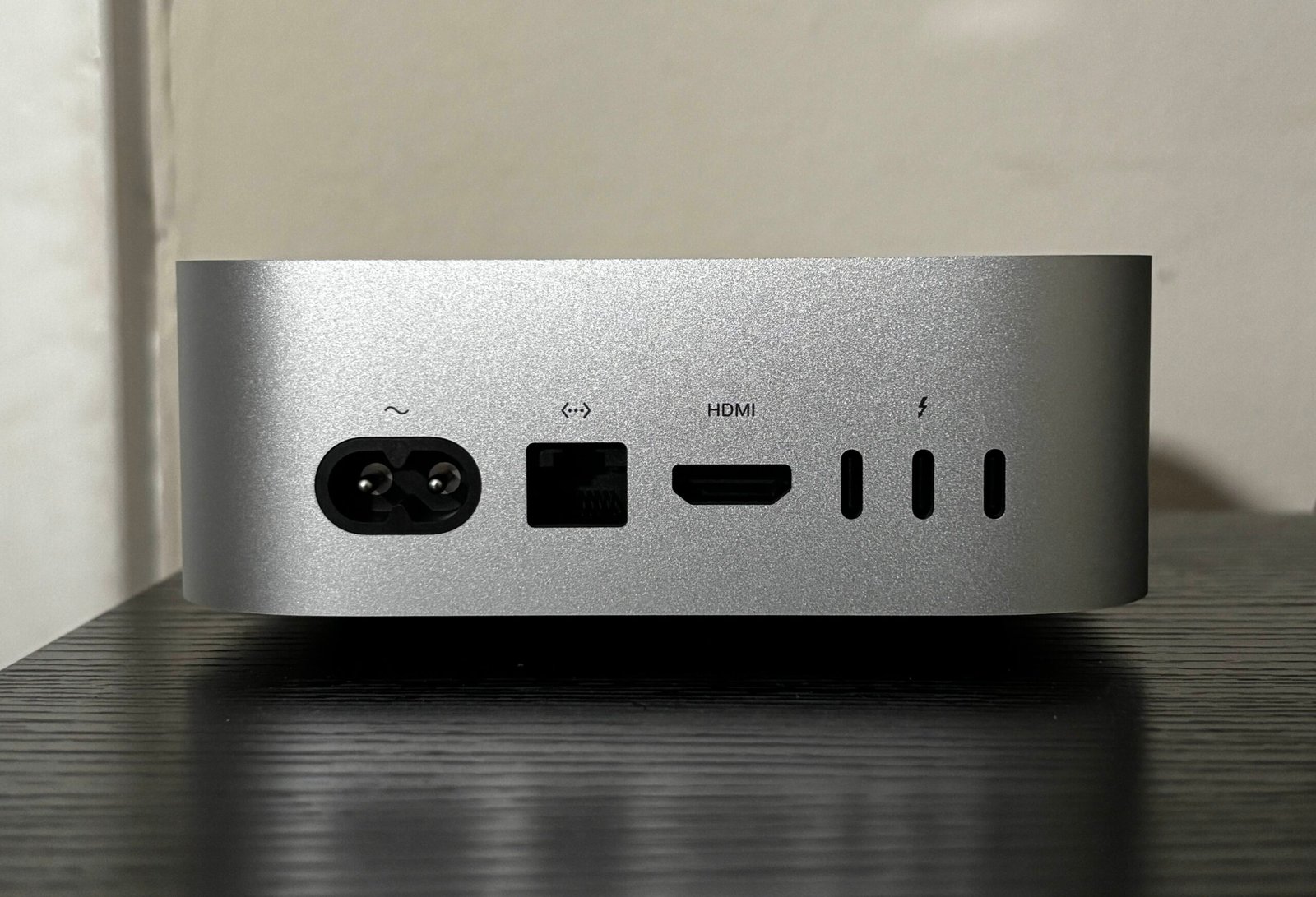 Back panel of a Mac mini showing its Thunderbolt, HDMI, and Ethernet ports