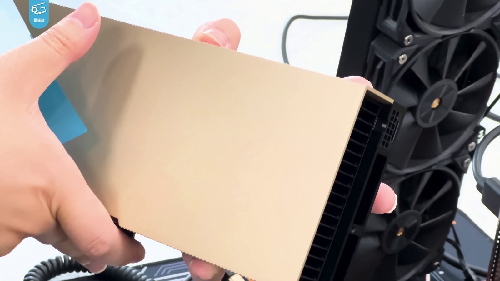 etched ai chip valuation 2026 - Nvidia H100 AI chip held in hand for scale
