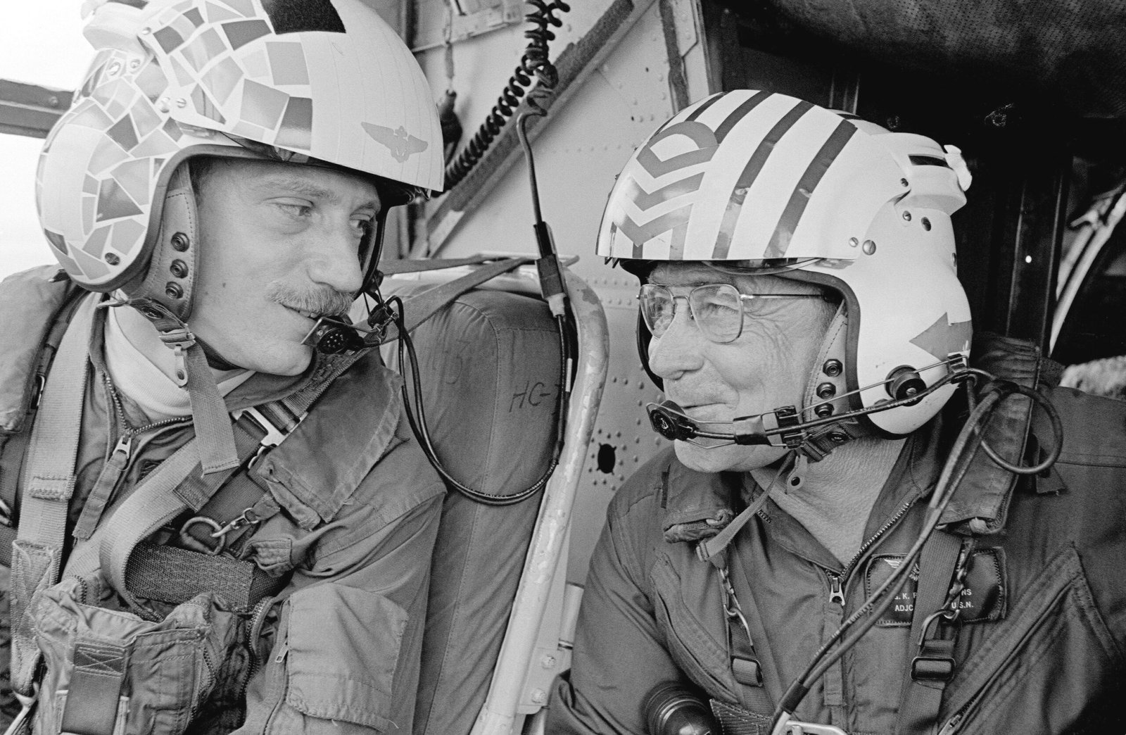 noise cancelling headphones origin story — pilot wearing headset in helicopter cockpit