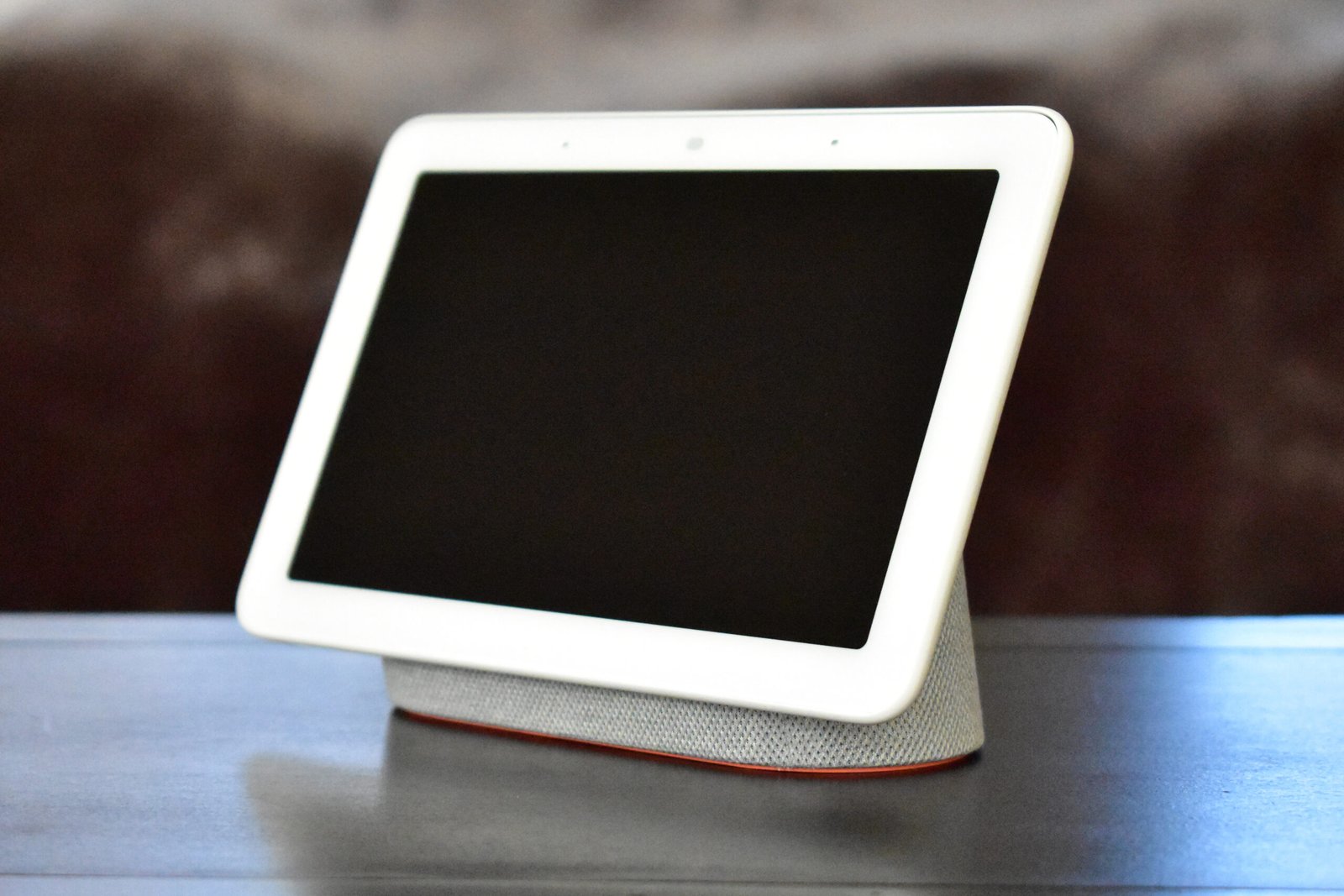 Google Home Hub smart display sitting on a table, an example of a connected smart home device on the network
